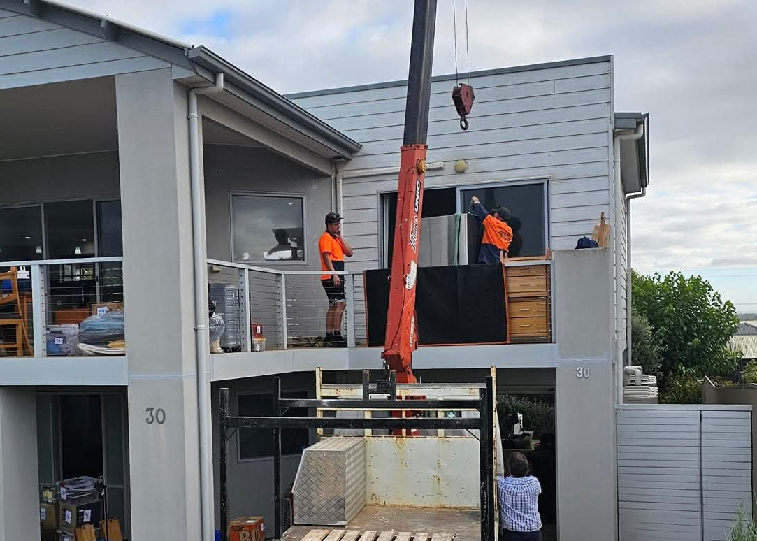 Crane-assisted removal service